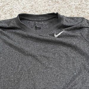 A grey Nike shirt